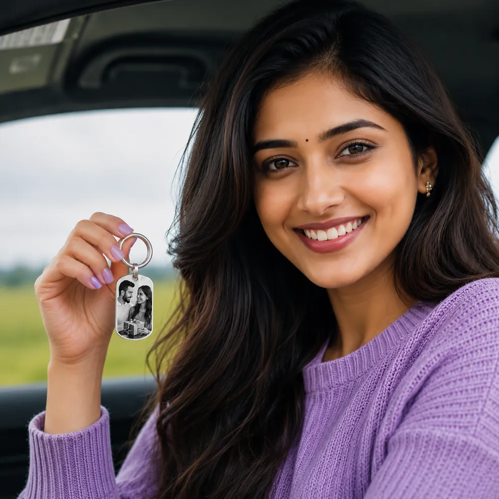 Man holding keys with a customized photo engraved keychain
